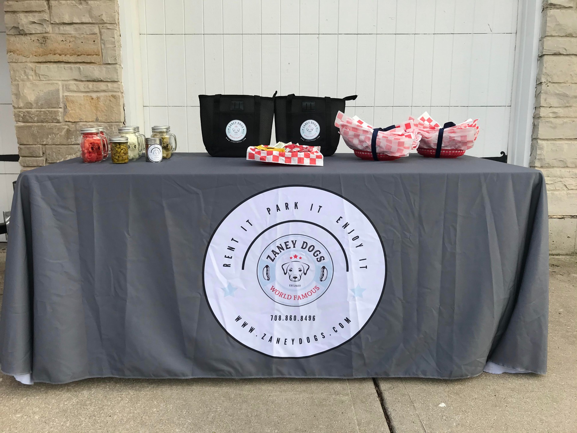 Clean, professional Zaney Dogs toppings bar